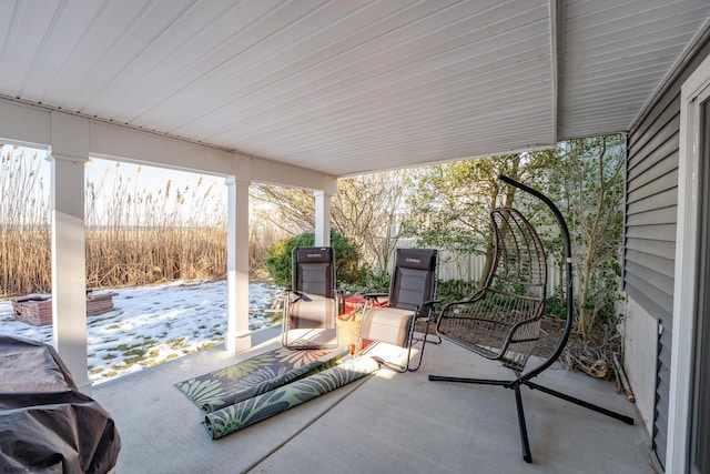 view of snow covered patio