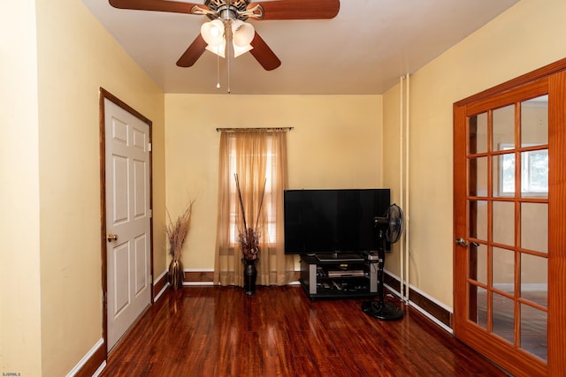 misc room featuring ceiling fan and dark hardwood / wood-style flooring