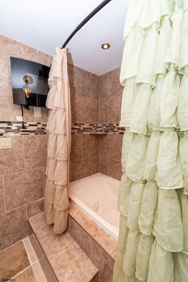 bathroom featuring shower / bath combination with curtain