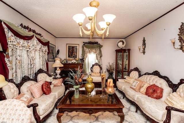 living room with a textured ceiling, ornamental molding, and a chandelier