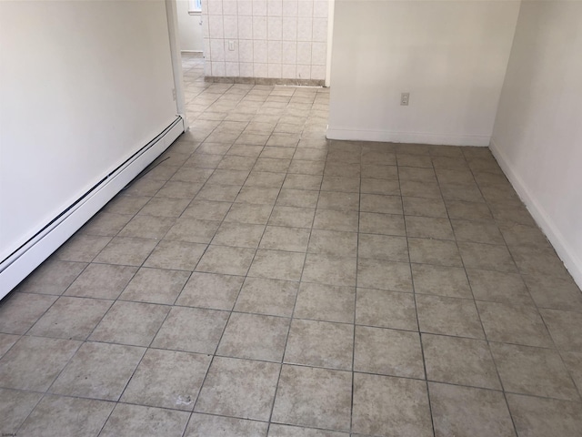 unfurnished room with light tile patterned floors