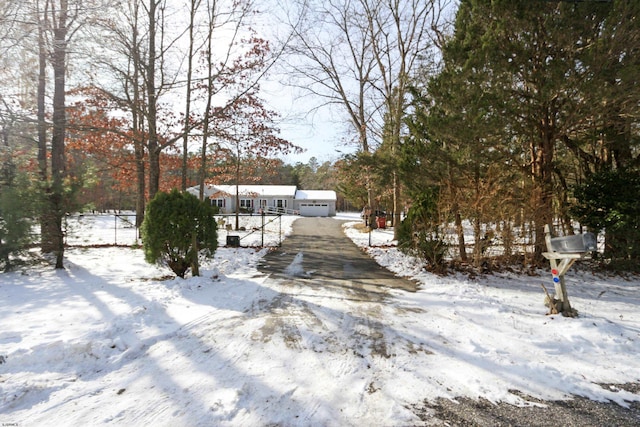 view of yard covered in snow