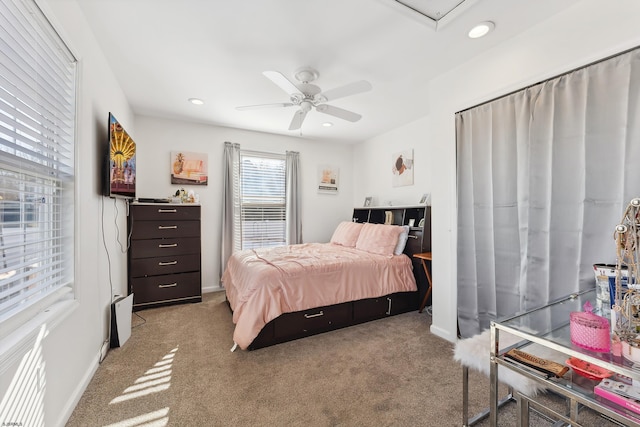 bedroom with ceiling fan and carpet floors