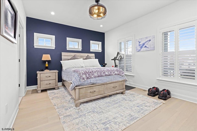 bedroom featuring light wood-type flooring