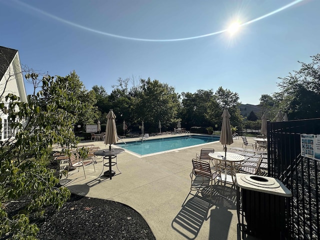 view of swimming pool featuring a patio area