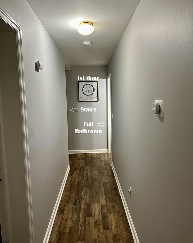 corridor featuring dark hardwood / wood-style floors