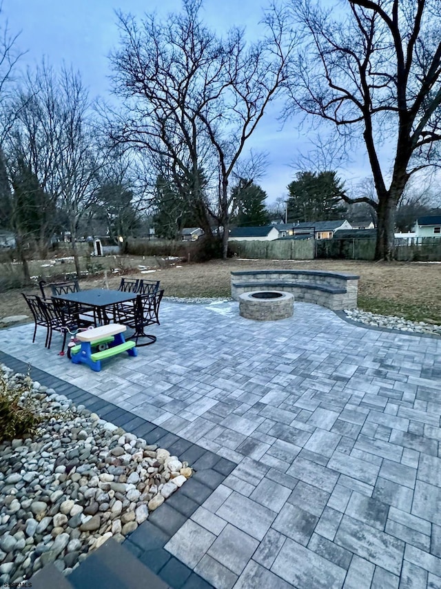 view of patio / terrace with a fire pit