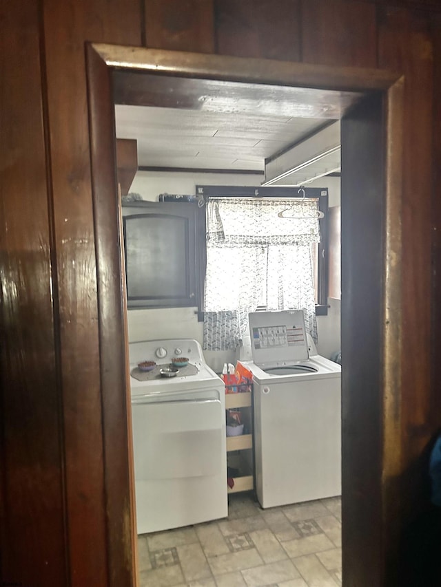 laundry area with washing machine and dryer