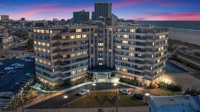 outdoor building at dusk with a water view