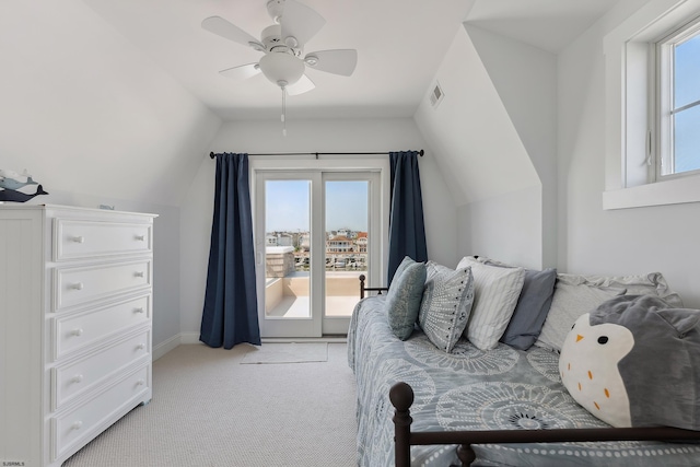 carpeted bedroom featuring ceiling fan, lofted ceiling, and access to outside