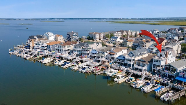 bird's eye view with a water view