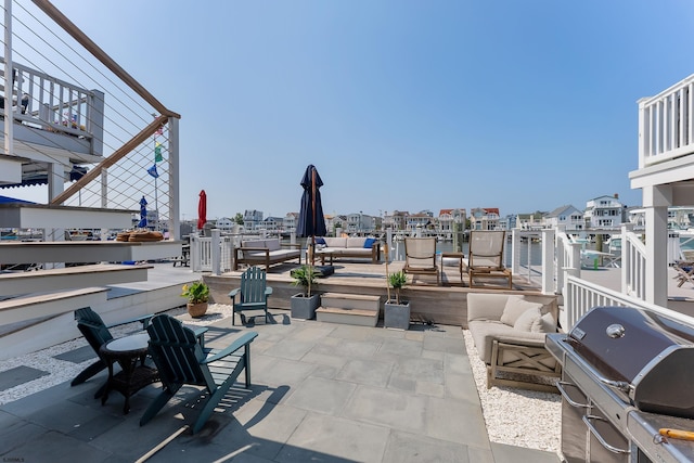 view of patio with a grill