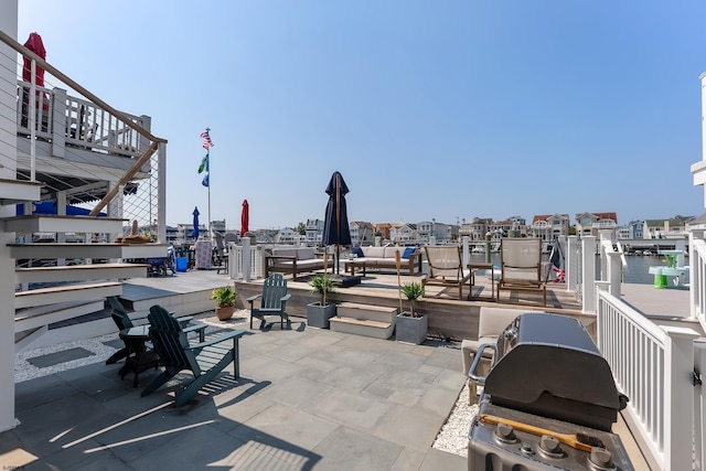 view of patio with a water view