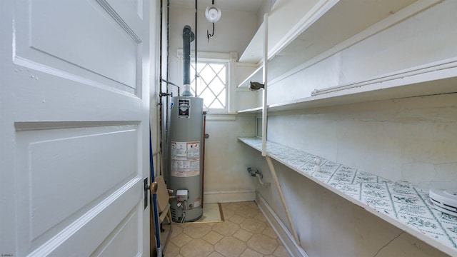 utility room with water heater