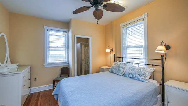 bedroom featuring ceiling fan and dark hardwood / wood-style flooring