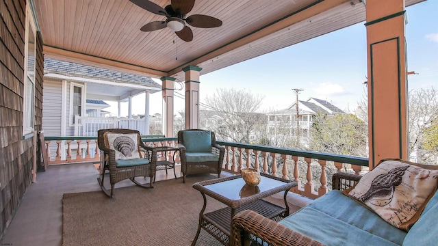 exterior space with ceiling fan and an outdoor hangout area