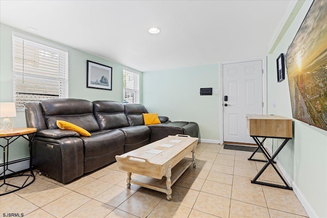 living room with light tile patterned floors