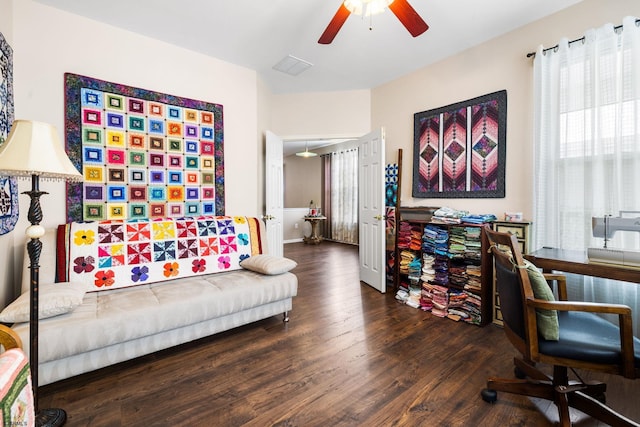 home office featuring ceiling fan and dark hardwood / wood-style flooring