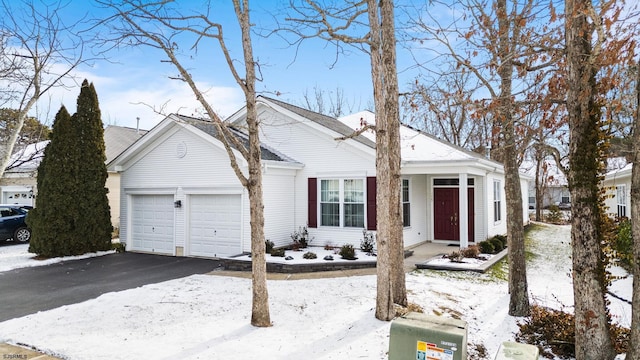 view of front of home with a garage