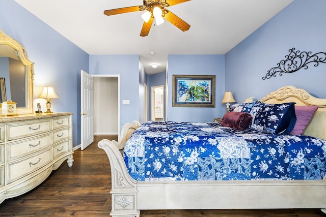 bedroom with ceiling fan and dark wood-type flooring