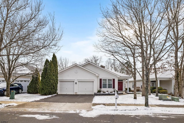 single story home with a garage