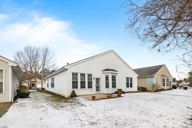 view of snow covered property