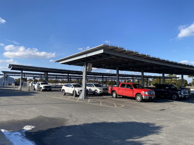 view of car parking featuring a carport