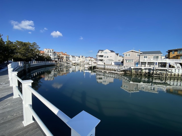 view of dock with a water view