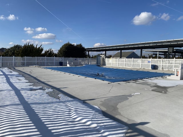 view of swimming pool with a patio