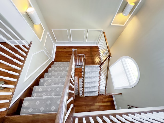 stairway with wood-type flooring