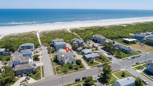 aerial view featuring a beach view and a water view