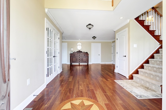 interior space featuring french doors, crown molding, and dark hardwood / wood-style floors