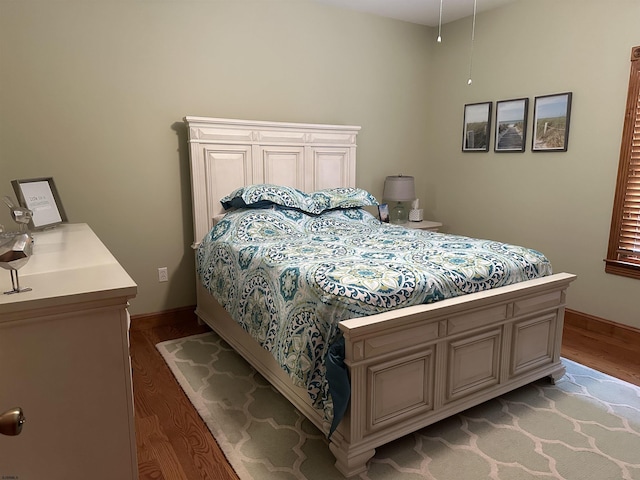 bedroom with light wood-type flooring