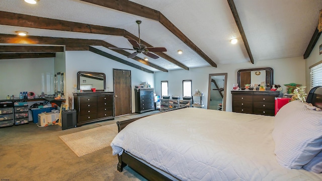 bedroom with ceiling fan, carpet flooring, and lofted ceiling with beams