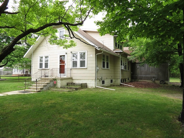 view of front facade featuring a front yard