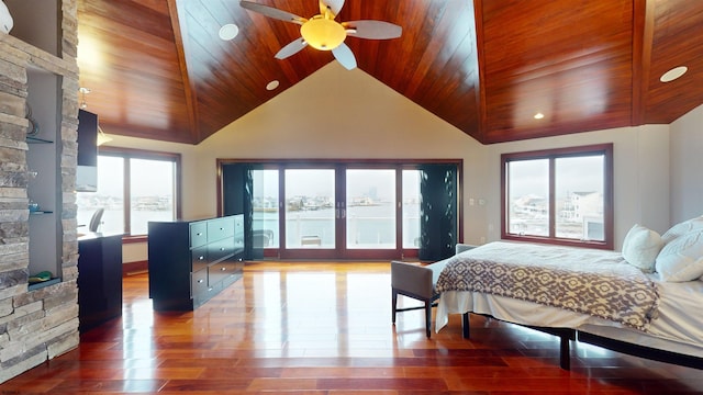 bedroom featuring ceiling fan, wooden ceiling, dark wood-type flooring, and high vaulted ceiling