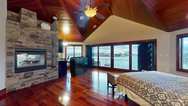 bedroom featuring ceiling fan, wooden ceiling, dark hardwood / wood-style floors, and a water view