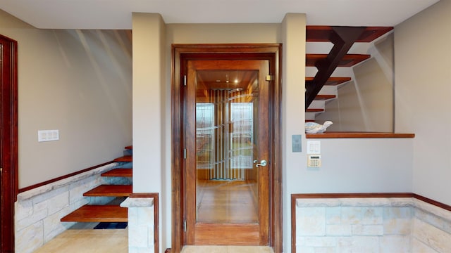 staircase with tile patterned flooring