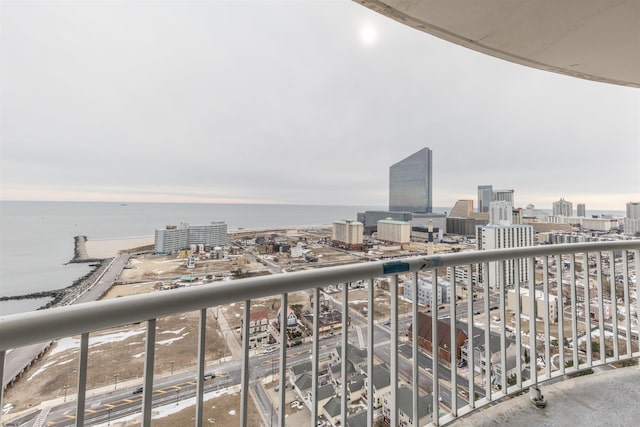 balcony featuring a water view