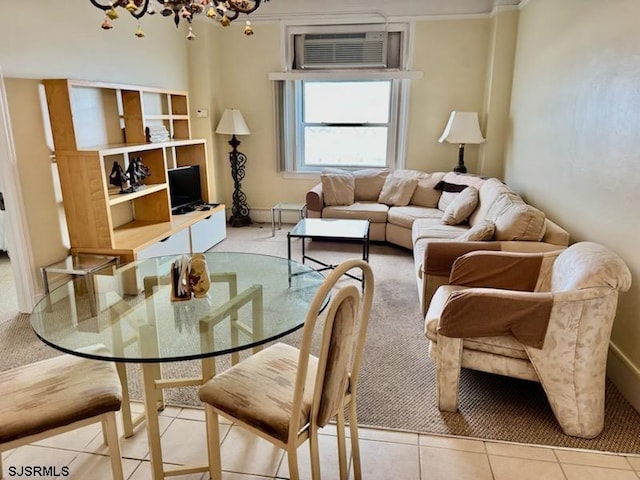 tiled living area featuring a chandelier and a wall mounted air conditioner