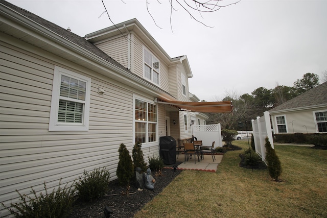 exterior space with a yard and a patio area