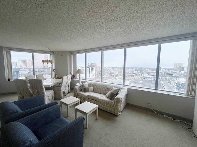 carpeted living room featuring a textured ceiling