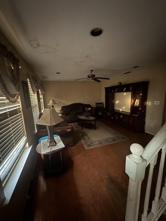 living room with dark hardwood / wood-style flooring