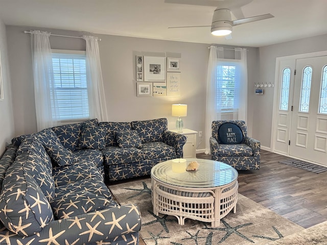 living room with ceiling fan, a healthy amount of sunlight, and hardwood / wood-style flooring