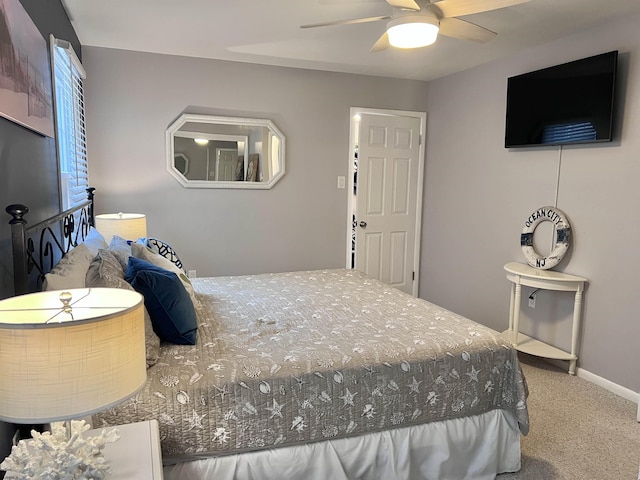 bedroom featuring ceiling fan and carpet floors