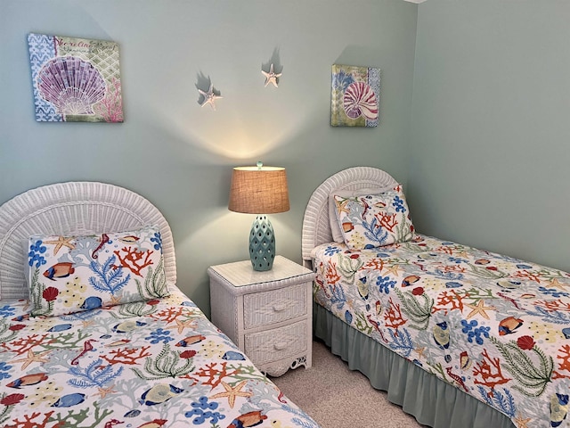 bedroom with light colored carpet