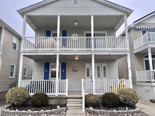 view of front of property featuring covered porch