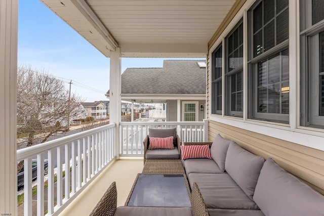 balcony with an outdoor hangout area