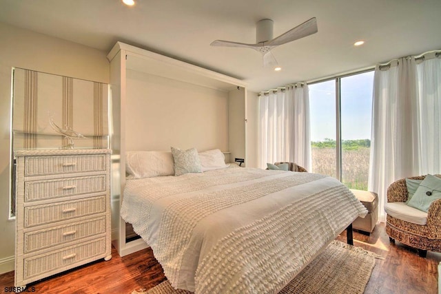 bedroom featuring ceiling fan, access to exterior, and dark hardwood / wood-style flooring