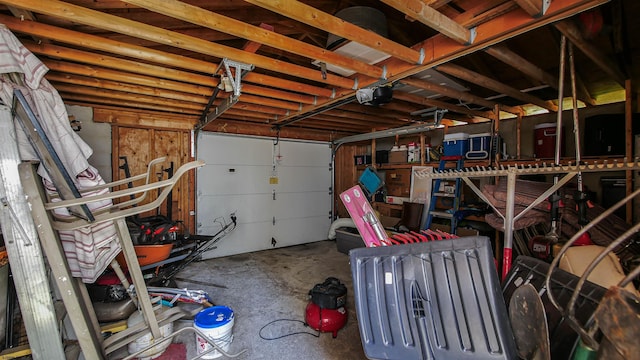 garage featuring a garage door opener